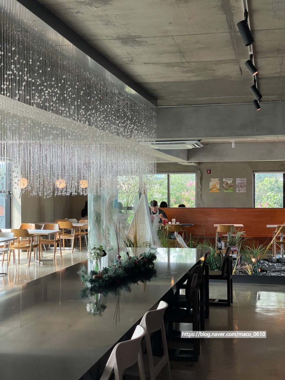 Spacious seating and modern interior at Cafe Maven