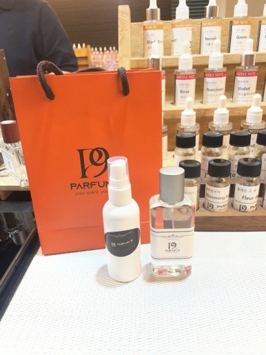 Perfume bottle and atomizer